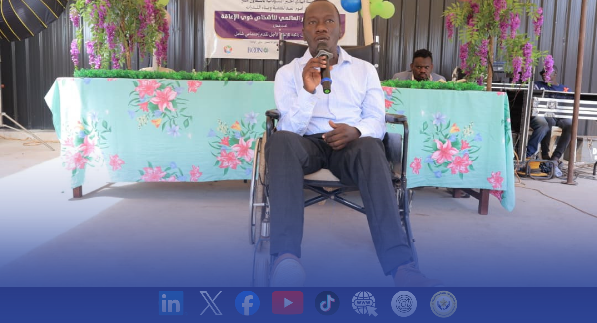 A participant addresses the gathering at the International Day of Persons with Disabilities event in Kiryandongo